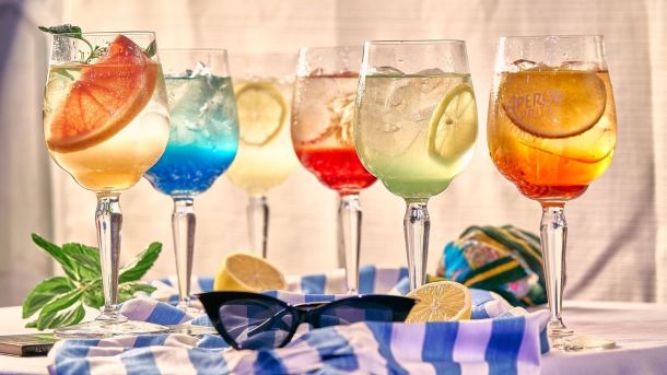Bright and vibrant summer cocktails with fresh fruits, perfect for a refreshing drink on a sunny day.